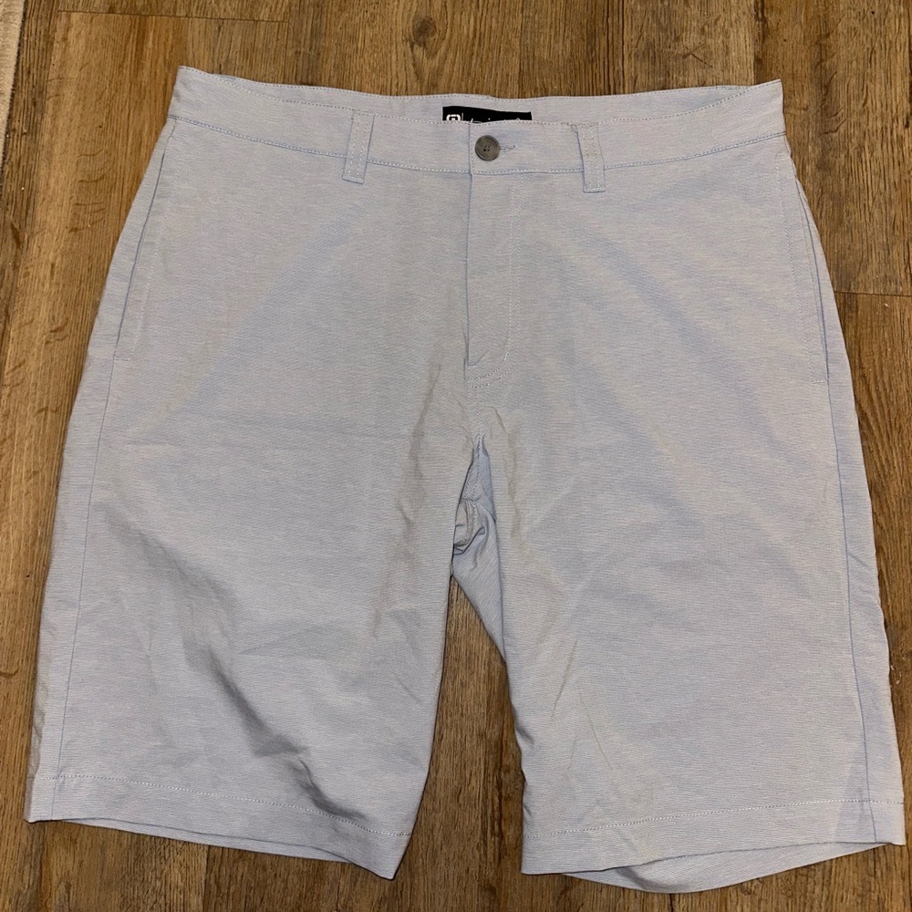 Travis Mathew Blue and White Striped Flat Front Shorts